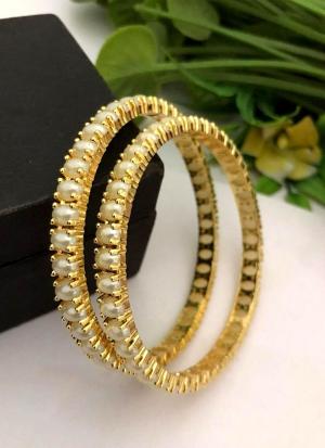 Gold Bangles Adorned with Pearls