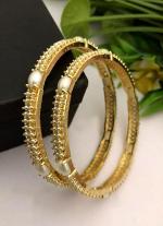 Gold Bangles with Pearl Highlights