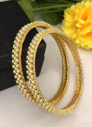 Gold Bangles with Luminous Pearls