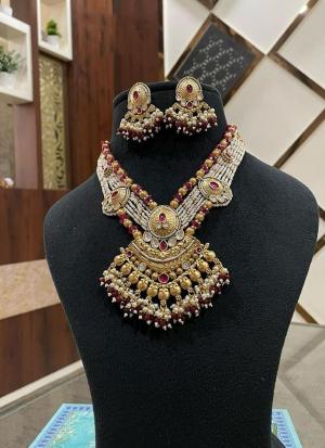 Ornate Gold Jewelry with Matching Earrings