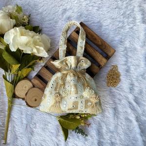 Light Beige And Golden Potli