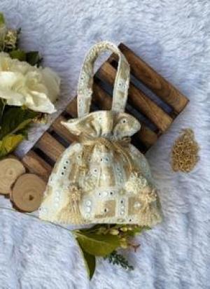 Light Beige And Golden Potli