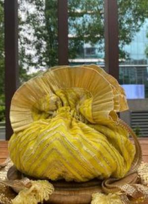Yellow And Golden Potli