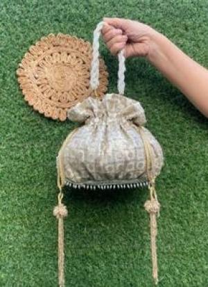 Light Beige And Golden Potli
