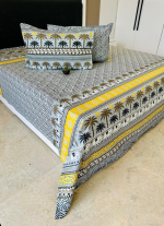 Yellow And White Bed Sheet